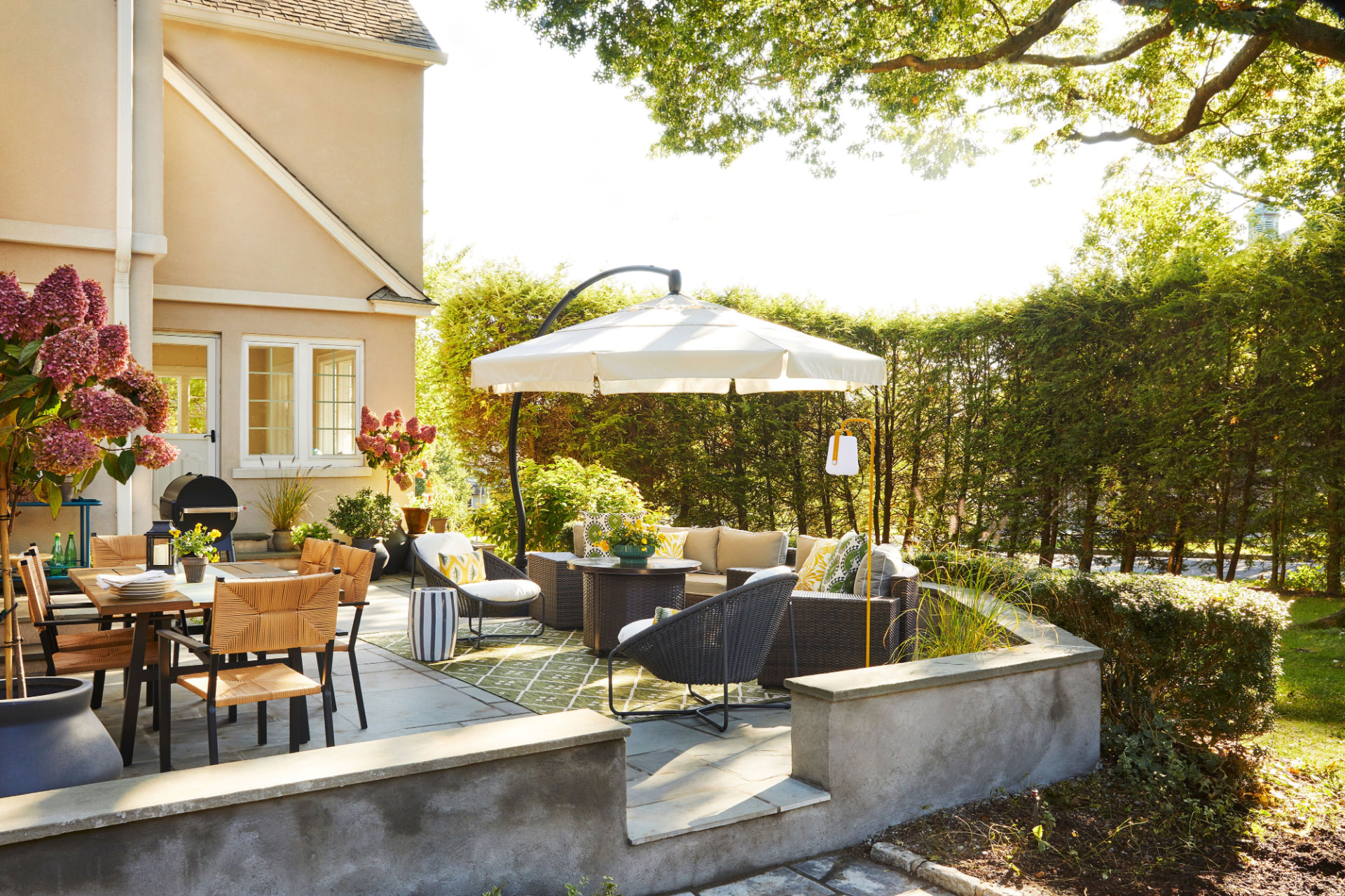 Raised concrete patio with seat walls and planters in Gainesville, Florida