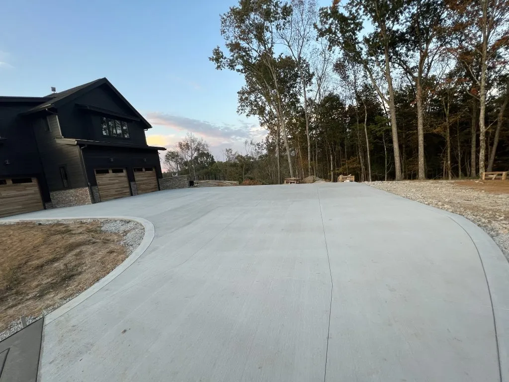 New curved concrete driveway at a modern home in Newberry, Florida