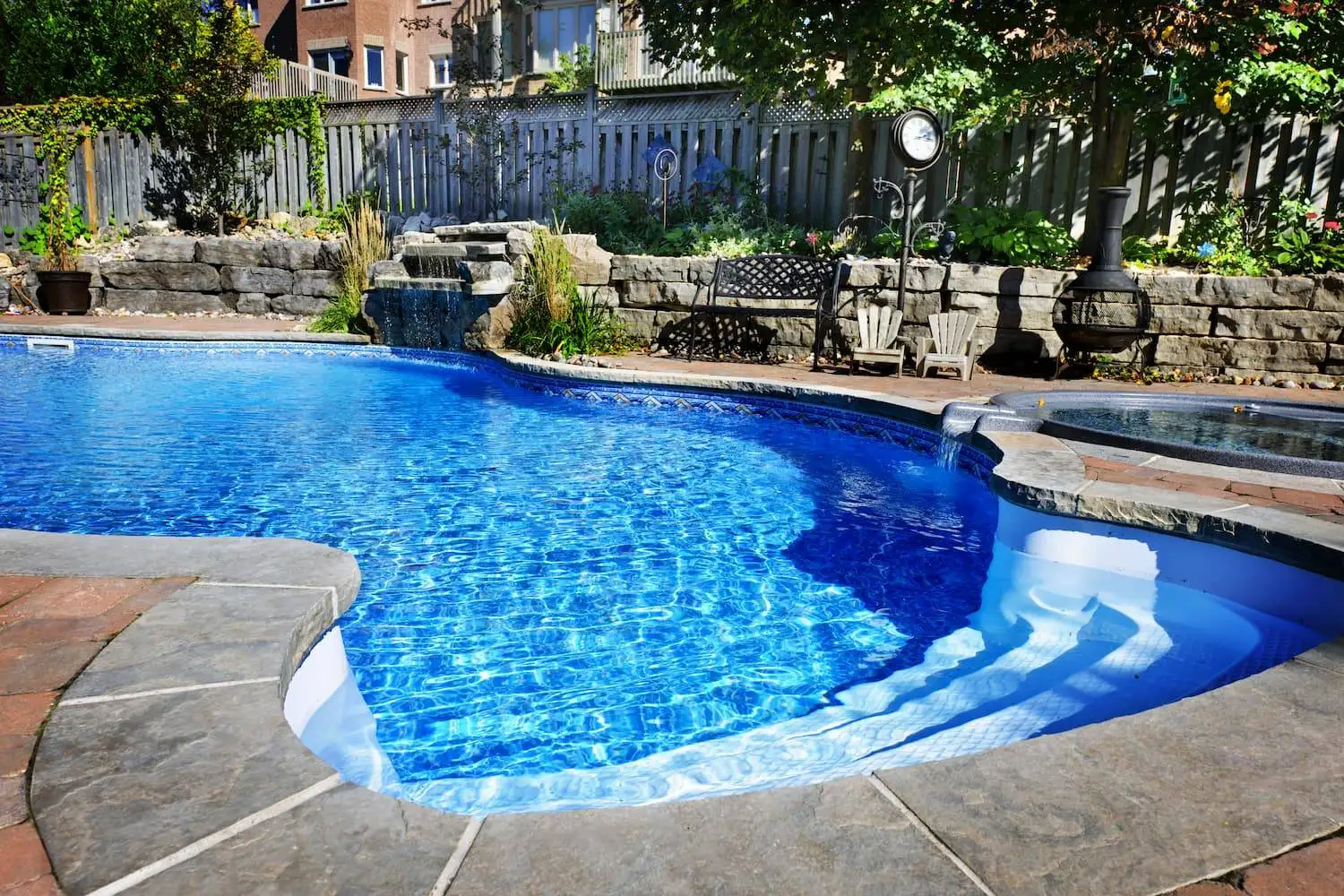 Textured concrete pool deck and spa surround in Micanopy, Florida