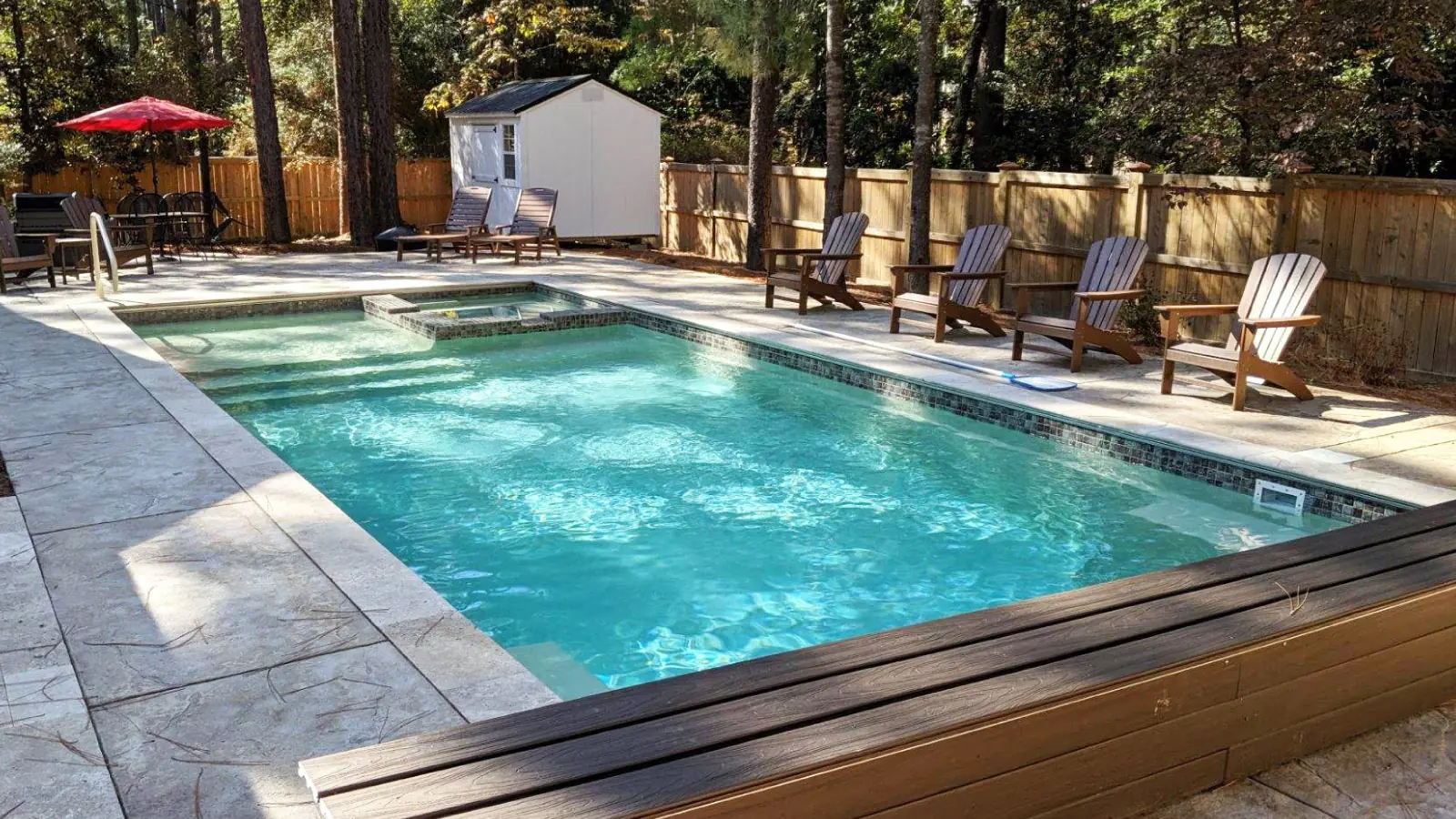 Stamped gray concrete pool deck surround in Marion County, Florida